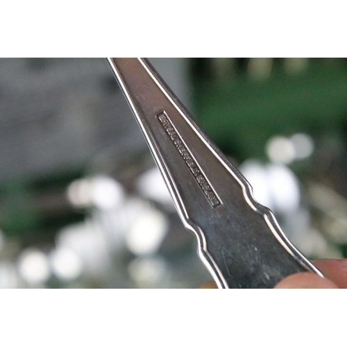 514 - Cased six setting canteen of silver plated cutlery together with a collection of theatre programmes