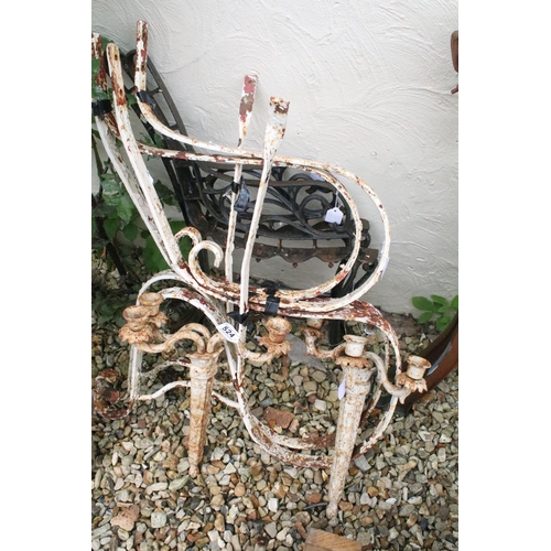 524 - Two pairs of iron garden bench supports to include a pair of white painted examples, together with a... 