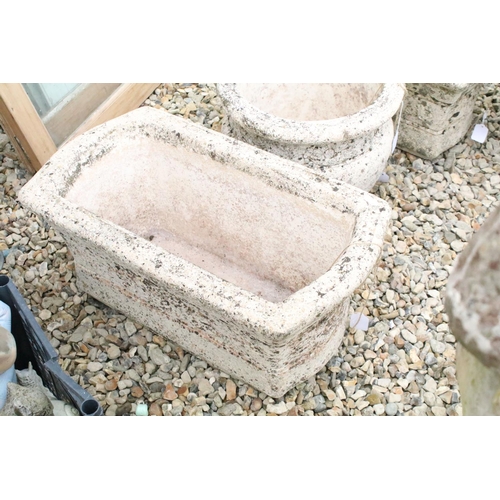 529 - Three Willowstone garden planters to include a pair of rectangular examples (approx 63cm long)