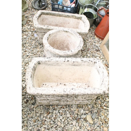 529 - Three Willowstone garden planters to include a pair of rectangular examples (approx 63cm long)