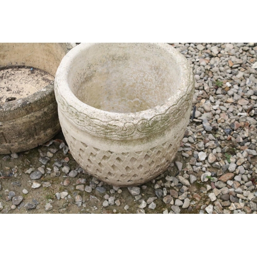 532 - Cotswold Range circular stone garden planter, together with a Cotswold Studios Ltd example. Tallest ... 