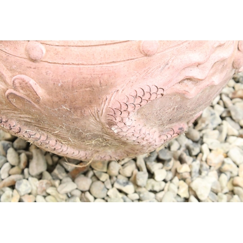 533 - Terracotta vase / planter of circular form, with relief dragon decoration and four handles, approx 4... 