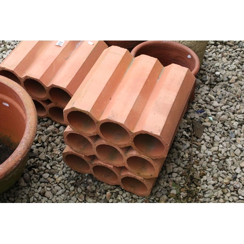 534 - Group of four terracotta garden planters (largest approx 43cm diameter), together with a five tier s... 