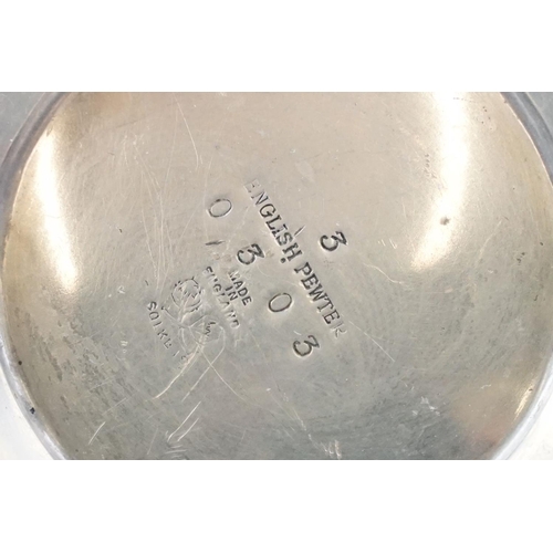 254 - An early twentieth century pewter tea set with peacock enamel decoration in the style of archibald k... 