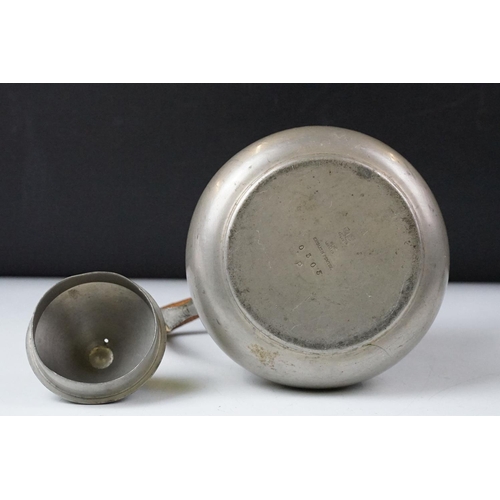 254 - An early twentieth century pewter tea set with peacock enamel decoration in the style of archibald k... 