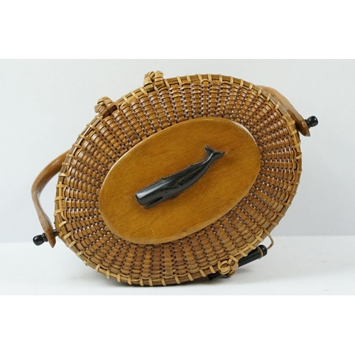 255 - Jose Formosa Reyes - Nantucket basket cocktail purse circa 1951. The purse of woven oval form with w... 
