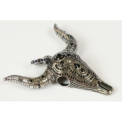 285 - A 925 sterling silver and onyx pendant in the form of a horned bulls skull.