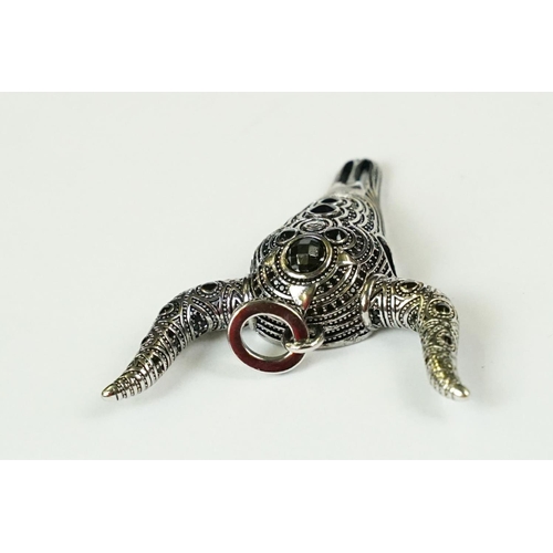 285 - A 925 sterling silver and onyx pendant in the form of a horned bulls skull.
