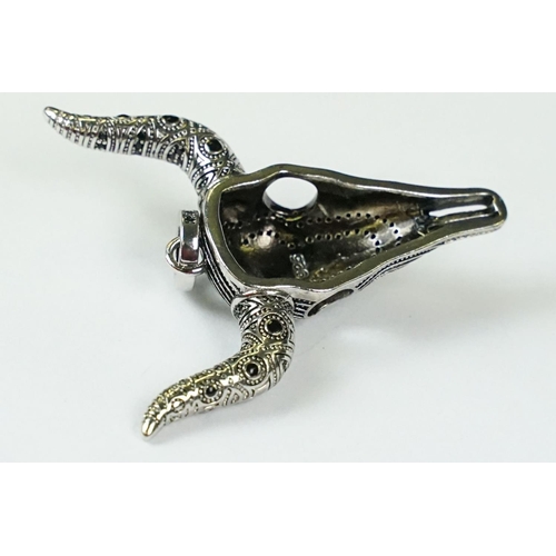 285 - A 925 sterling silver and onyx pendant in the form of a horned bulls skull.