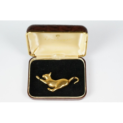 290 - Gilt pouncing cat brooch