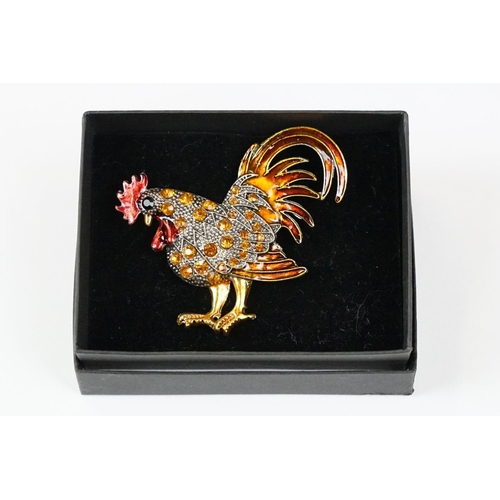 293 - Gilt, enamel and diamonte chicken brooch