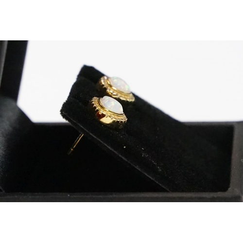 303 - Pair of gold plated and silver opal and CZ earrings