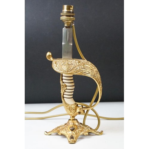 431 - Pair of brass table lamps of classical form, the supports modelled as spiralling leaves with soldier... 