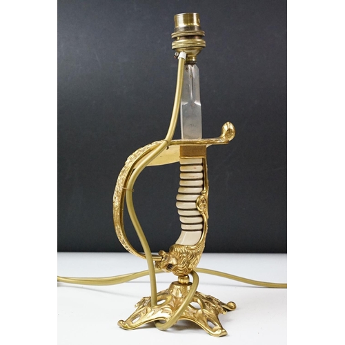 431 - Pair of brass table lamps of classical form, the supports modelled as spiralling leaves with soldier... 