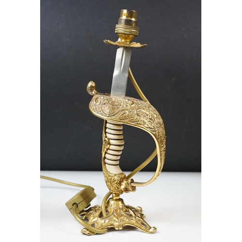 431 - Pair of brass table lamps of classical form, the supports modelled as spiralling leaves with soldier... 