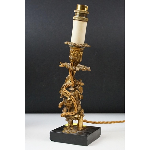 431 - Pair of brass table lamps of classical form, the supports modelled as spiralling leaves with soldier... 