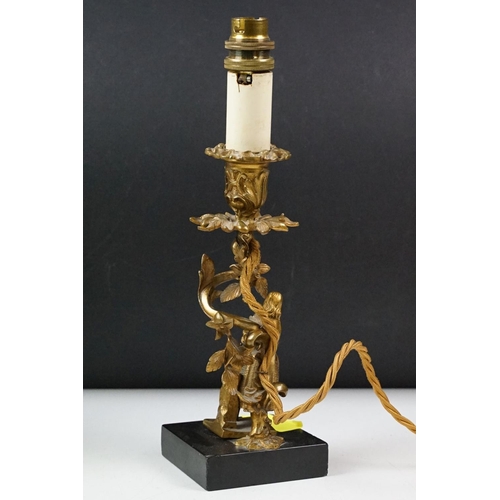 431 - Pair of brass table lamps of classical form, the supports modelled as spiralling leaves with soldier... 