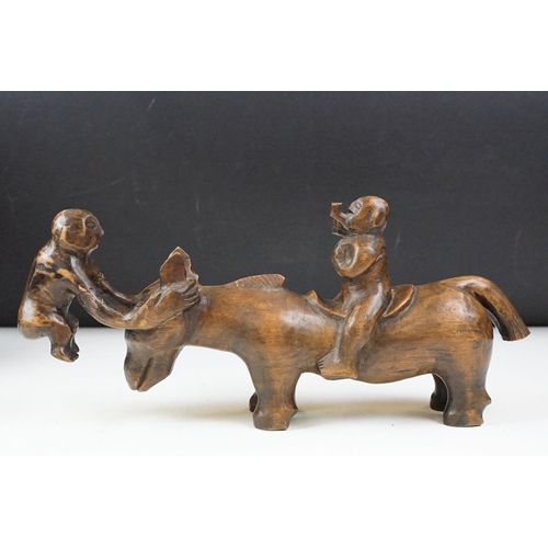 434 - Collection of carved wooden figurines to include some African Tribal examples,  a mother and child f... 