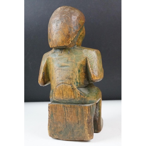 434 - Collection of carved wooden figurines to include some African Tribal examples,  a mother and child f... 