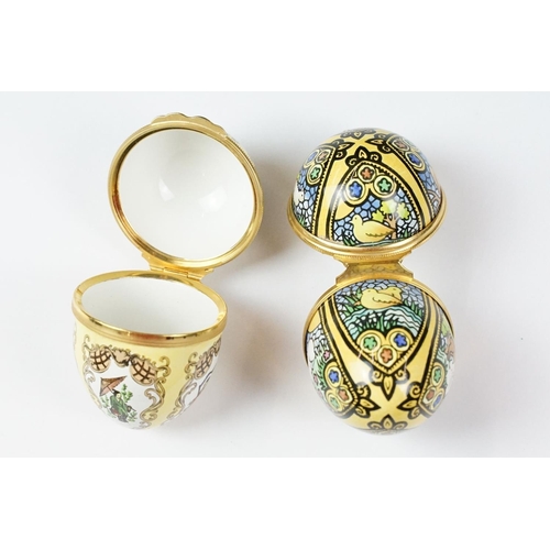 435 - Two 'British Coal Mining' brass miners lamps, together with a pair of barley twist wooden candlestic... 