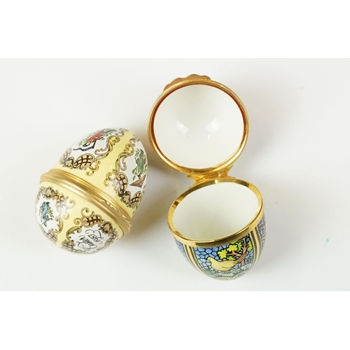 435 - Two 'British Coal Mining' brass miners lamps, together with a pair of barley twist wooden candlestic... 