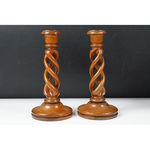 435 - Two 'British Coal Mining' brass miners lamps, together with a pair of barley twist wooden candlestic... 