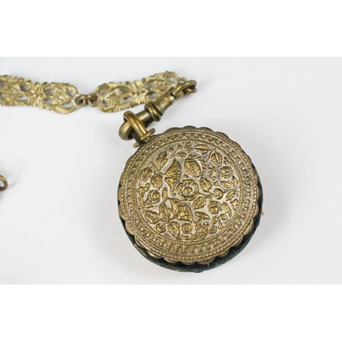 208 - An antique brass Chatelaine complete with pencil, pin cushion, scissors and thimble.