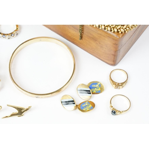 214 - Collection of gilt yellow metal and gold jewellery including brooches and bangles