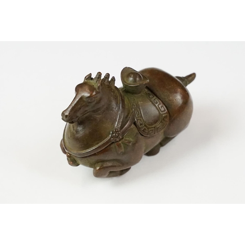 223 - A Chinese copper writing brush / pen washer statue in the form of a horse, removable lid, measures a... 