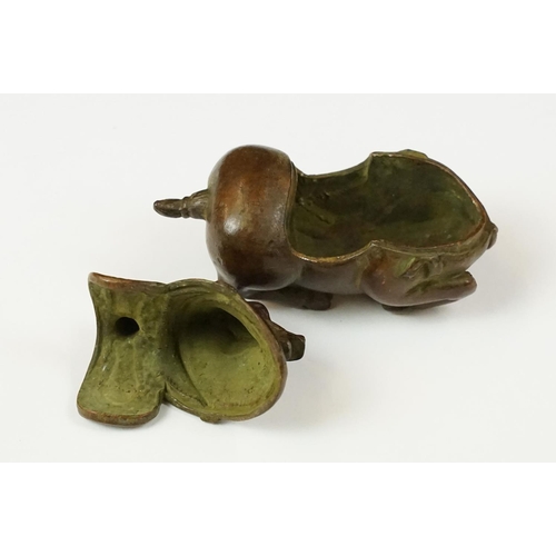 223 - A Chinese copper writing brush / pen washer statue in the form of a horse, removable lid, measures a... 