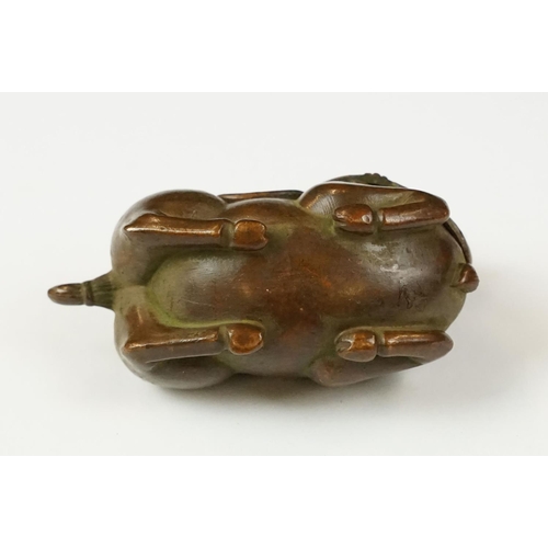 223 - A Chinese copper writing brush / pen washer statue in the form of a horse, removable lid, measures a... 