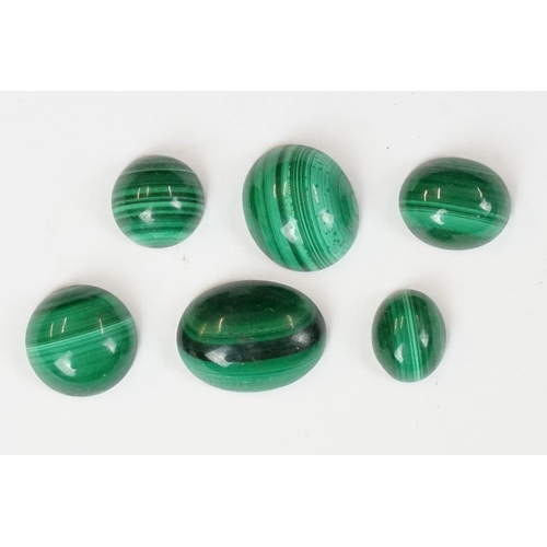 232 - A small collection of opal and malachite polished cobochons.