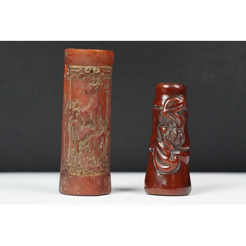 240 - Two oriental Netsuke with decorative animal carvings.