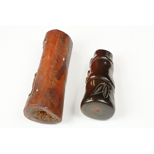 240 - Two oriental Netsuke with decorative animal carvings.