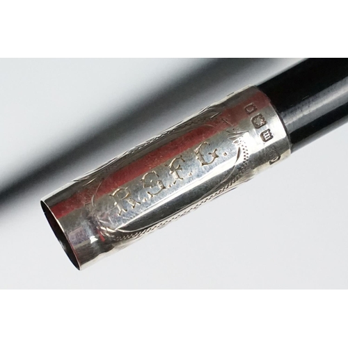 247 - An early 20th century Conductors Baton with hallmarked sterling silver mounts, maker marker for Oska... 