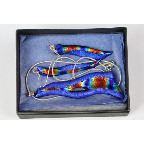 248 - A small group of costume jewellery to include a Lea Stein brooch in the form of a horse.