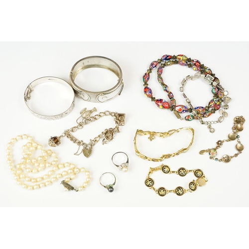 249 - A small collection of mixed jewellery to include a large fully hallmarked sterling silver cuff bangl... 