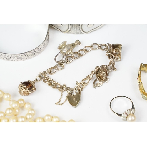 249 - A small collection of mixed jewellery to include a large fully hallmarked sterling silver cuff bangl... 