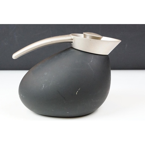 252 - A Georg Jensen thermos together with a Norman Copenhagen bowl.