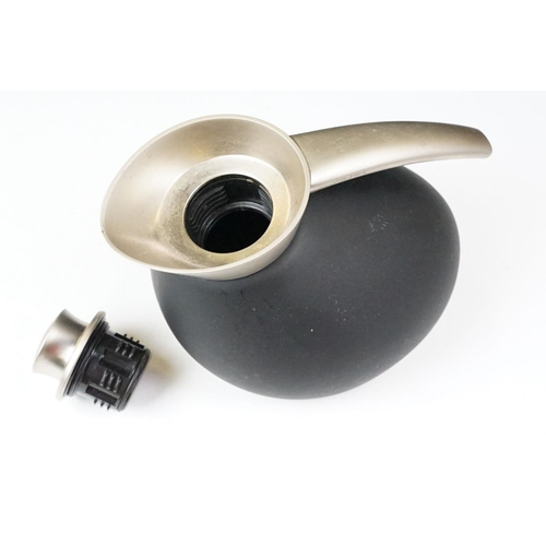 252 - A Georg Jensen thermos together with a Norman Copenhagen bowl.