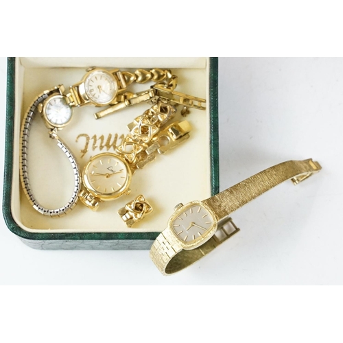 343 - A wooden cased mantle clock together with another clock and a selection of ladies watches and costum... 