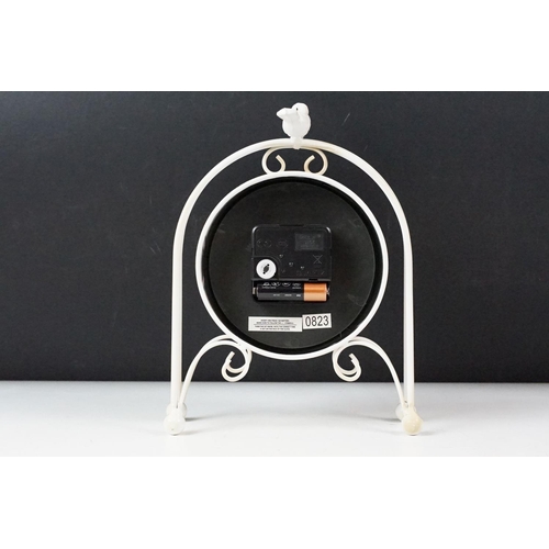 343 - A wooden cased mantle clock together with another clock and a selection of ladies watches and costum... 