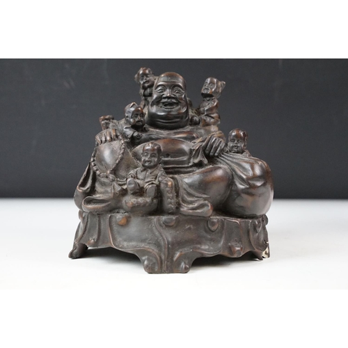 345 - A vintage hand carved ebony letter opener together with a tribal figure and resin buddah with two fr... 