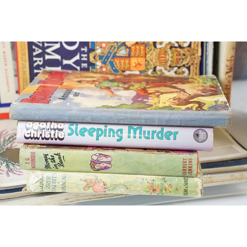 348 - A box of mixed collectables to include ephemera, books, postcards and a Beswick figurine.