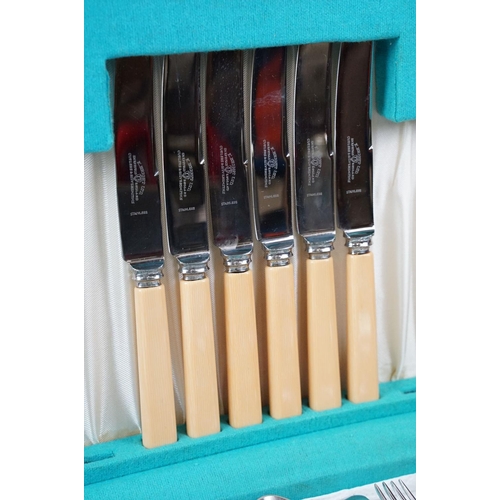 349 - A collection of mixed silver plate to include a canteen, mixed cutlery, teapot....etc..