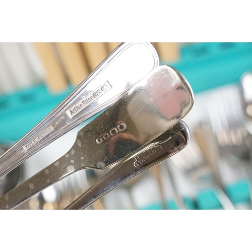 349 - A collection of mixed silver plate to include a canteen, mixed cutlery, teapot....etc..