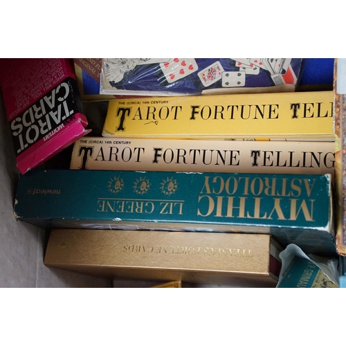352 - A box of mixed Tarrot card sets together with reading guides.