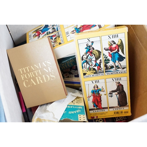 352 - A box of mixed Tarrot card sets together with reading guides.