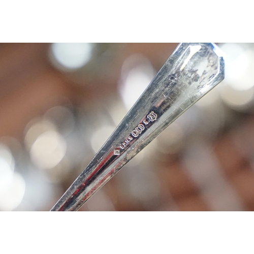 621 - Art Deco style walnut canteen of cutlery, on stretchered stand, containing silver plated flatware, 7... 