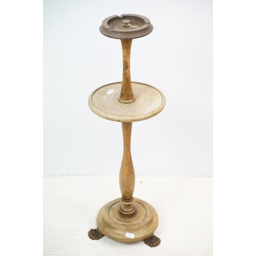 179 - Late 19th / early 20th century wooden ashtray raised on three paw feet, a carved oak mantel clock & ... 